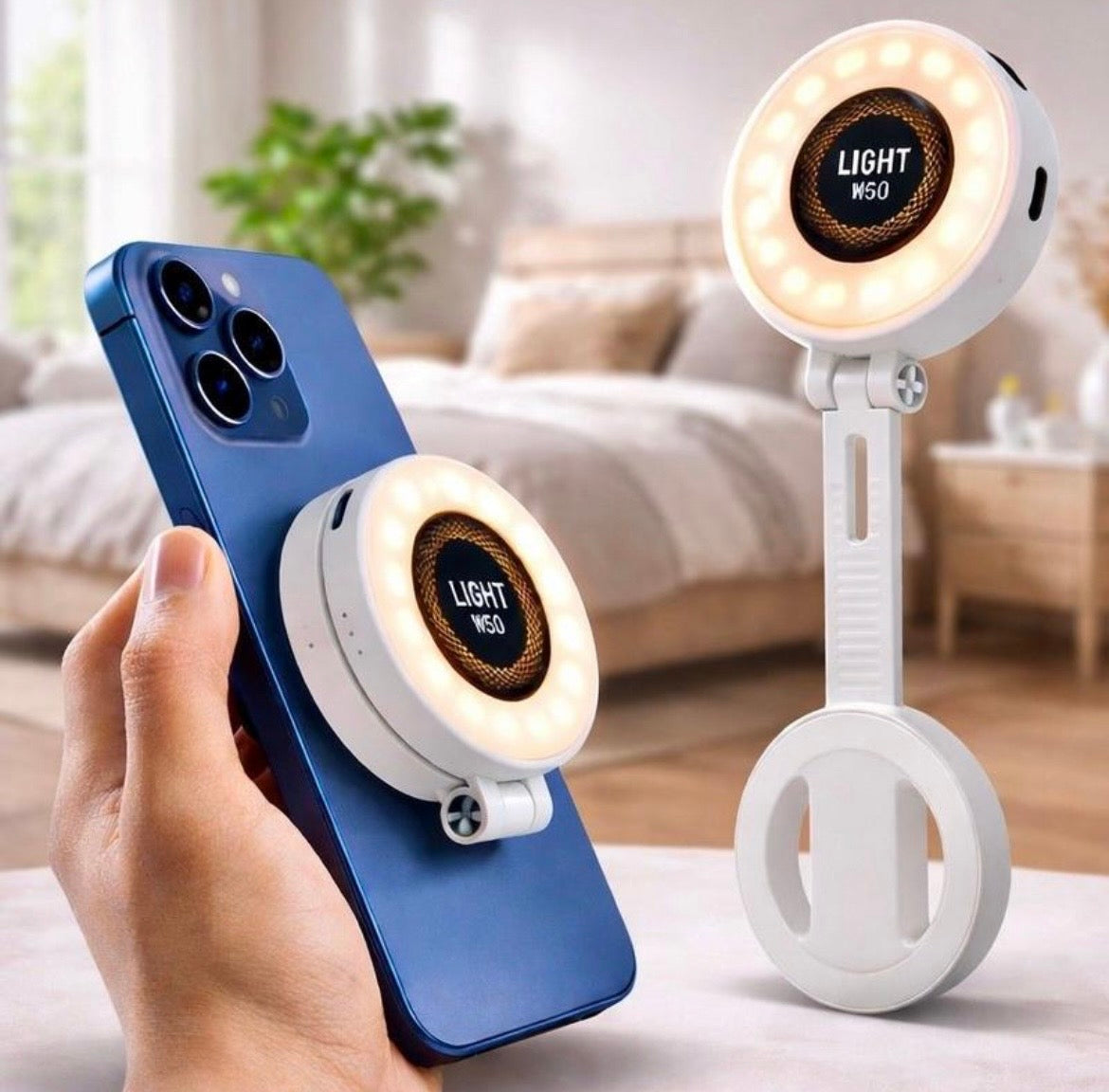 White W50 MagSafe magnetic LED fill light attached to a smartphone and extended for photography