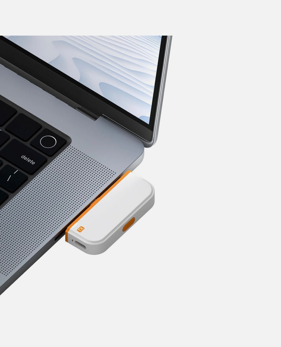 USB-C wireless HDMI transmitter connected to a laptop